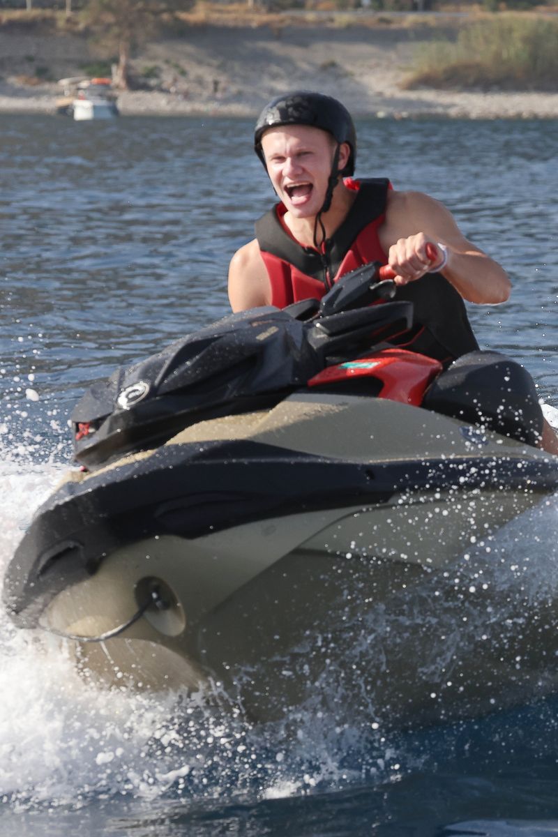Haaland enjoyed one of the highlights of his Italian vacation with a scenic jet ski ride along the Sicilian coast.