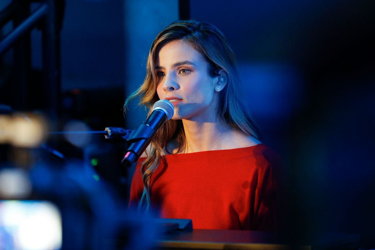 Giulia Be is a Brazilian singer-songwriter and actress known for hits including 'Menina Solta.'