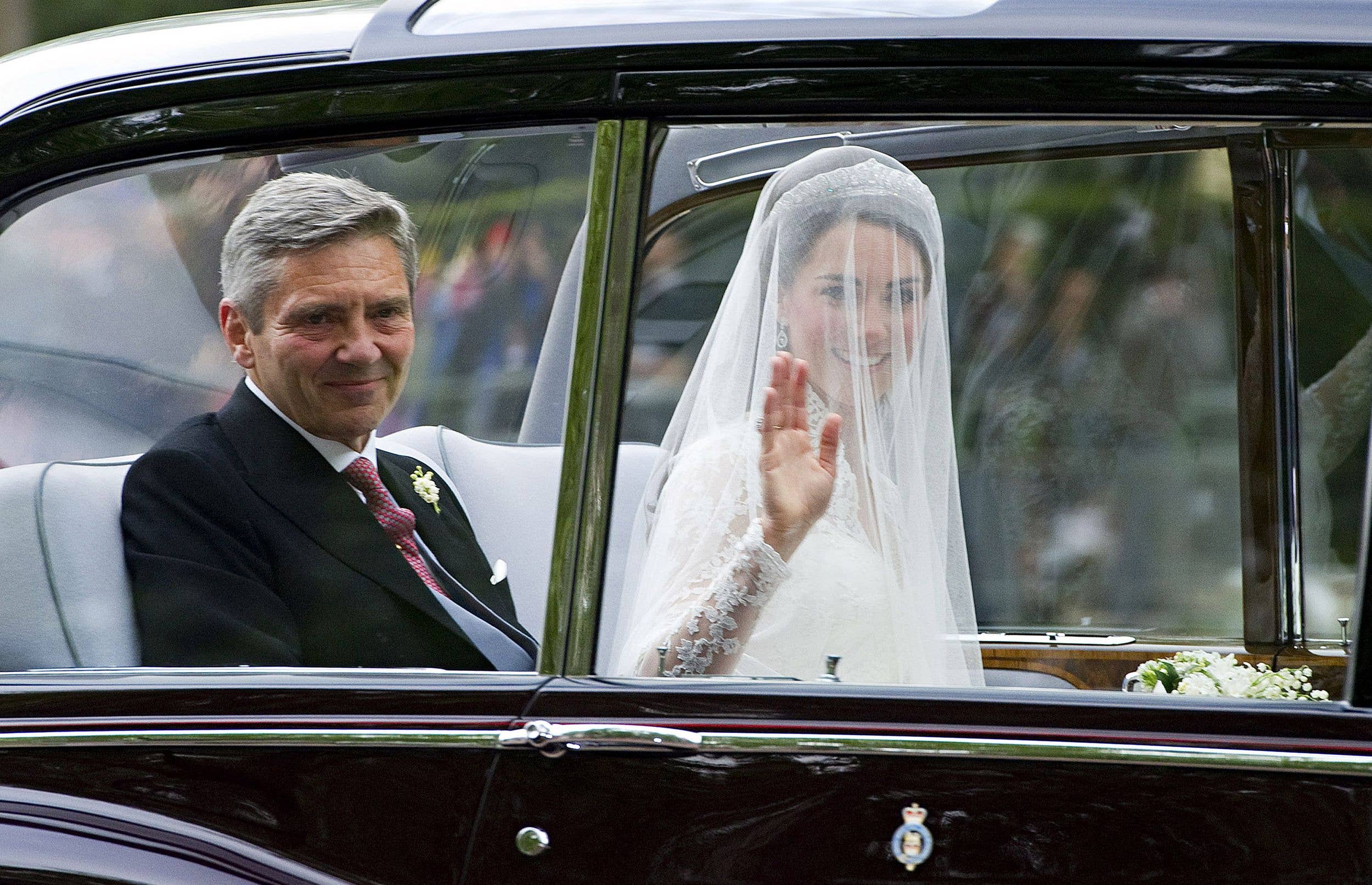 Michael Middleton pictured with his firstborn on her wedding day in 2011
