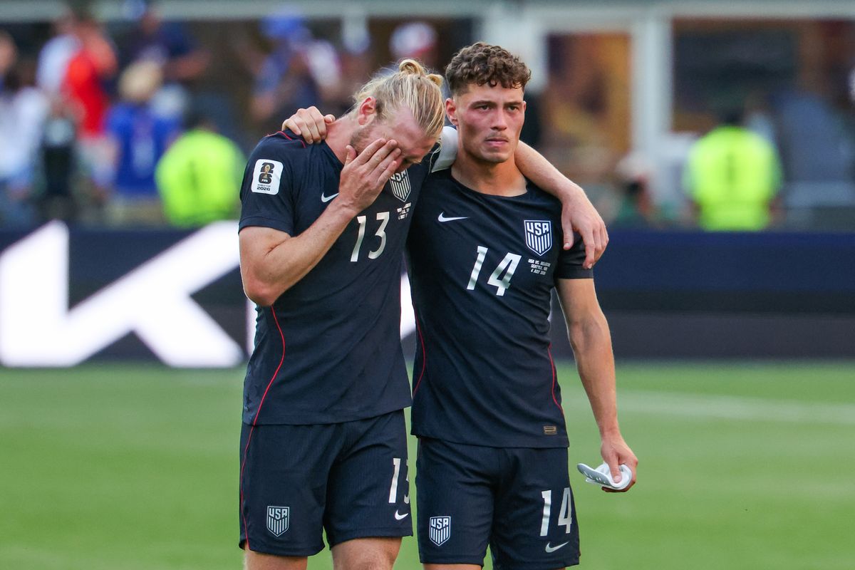 Tim Ream (L) #13 and Sebastian Berhalter #14 of the United States lament after a 4-1 loss in the FIFA World Cup 2026.