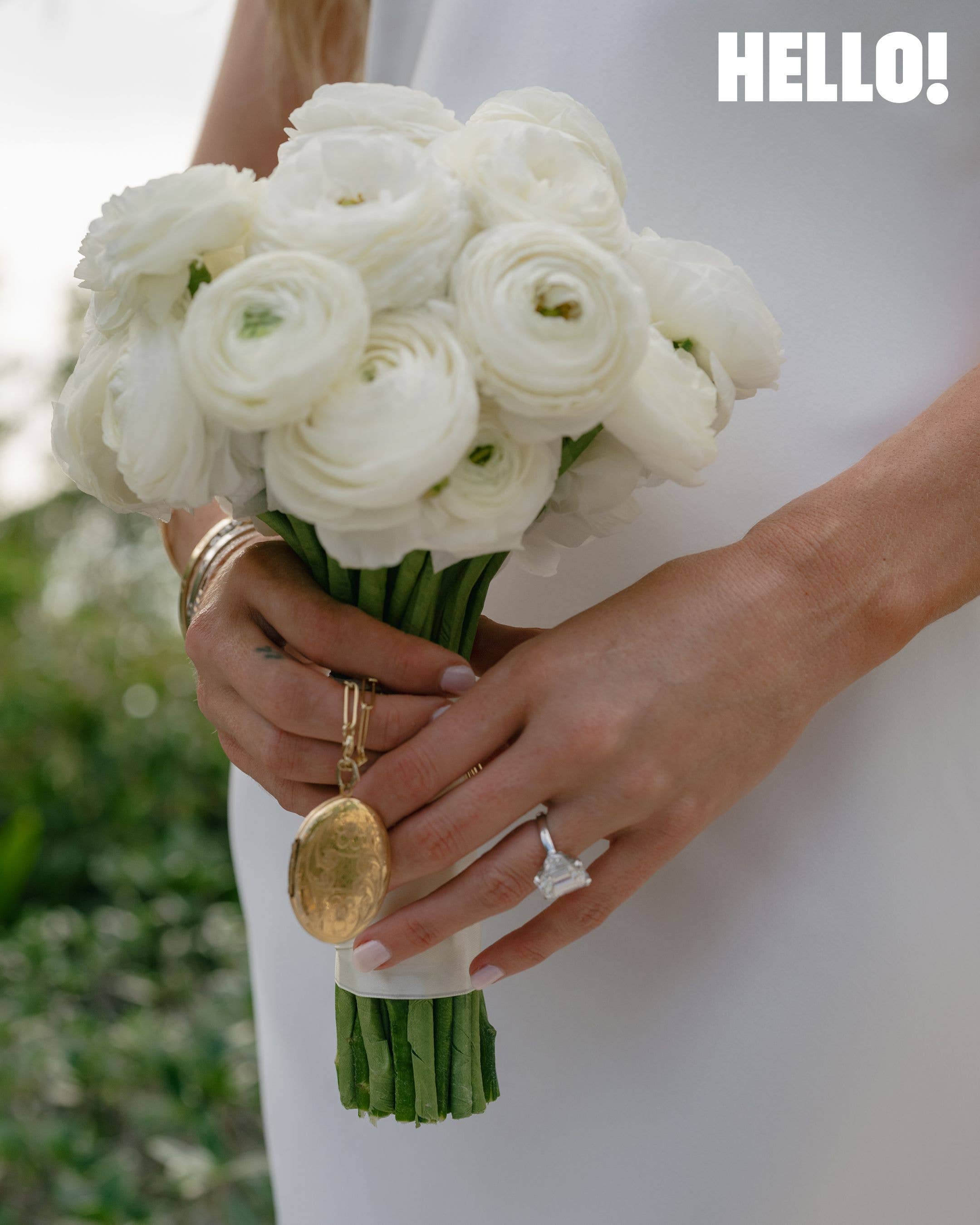 The bride kept her late father close on her wedding day, carrying a locket he had given her