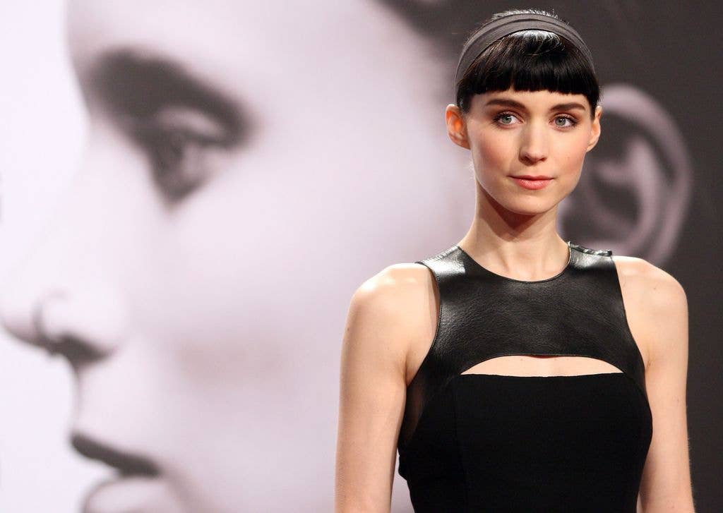 Actress Rooney Mara arrives for the German premiere of the film 'The Girl With the Dragon Tattoo,' ('Verblendung') the first part of a series of film versions of the 'Millennium Trilogy,' based on books of the same name by Swedish author Stieg Larsson, on January 5, 2012 in Berlin, Germany. 