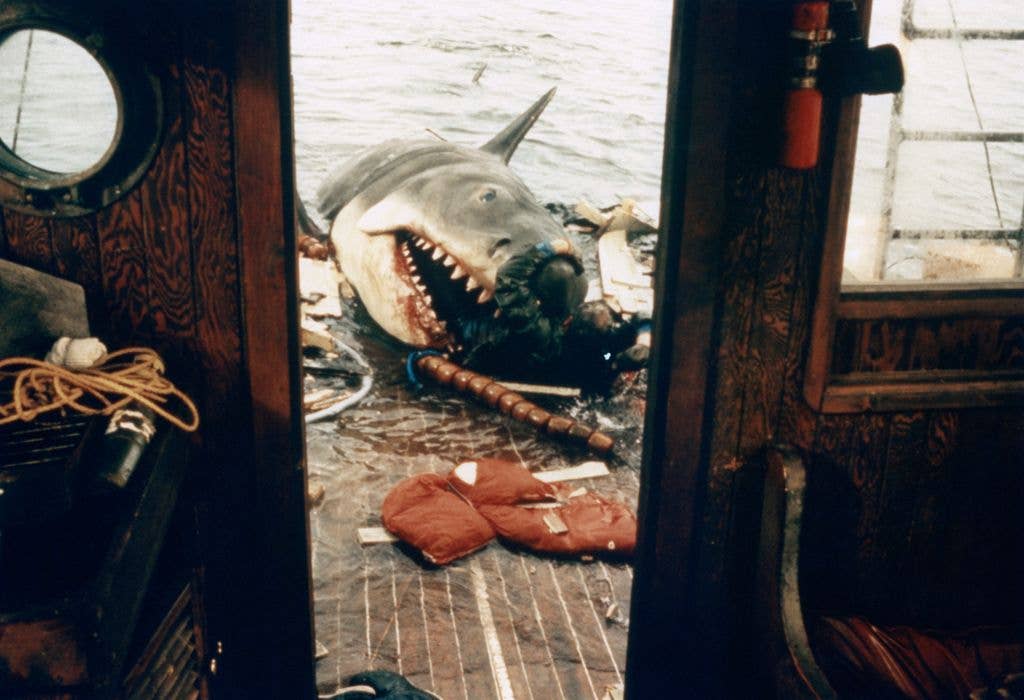 A shark eating Robert Shaw in scene from the classic 1974 Steven Spielberg movie 'Jaws'. 