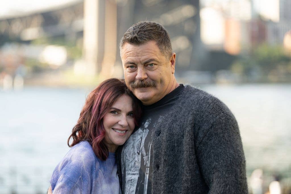 Megan Mullally and Nick Offerman pose for a photo during the Vivid Sydney Unscripted and Unfiltered in conversation press conference at Pier One Sydney Harbour on June 12, 2025 in Sydney, Australia. 