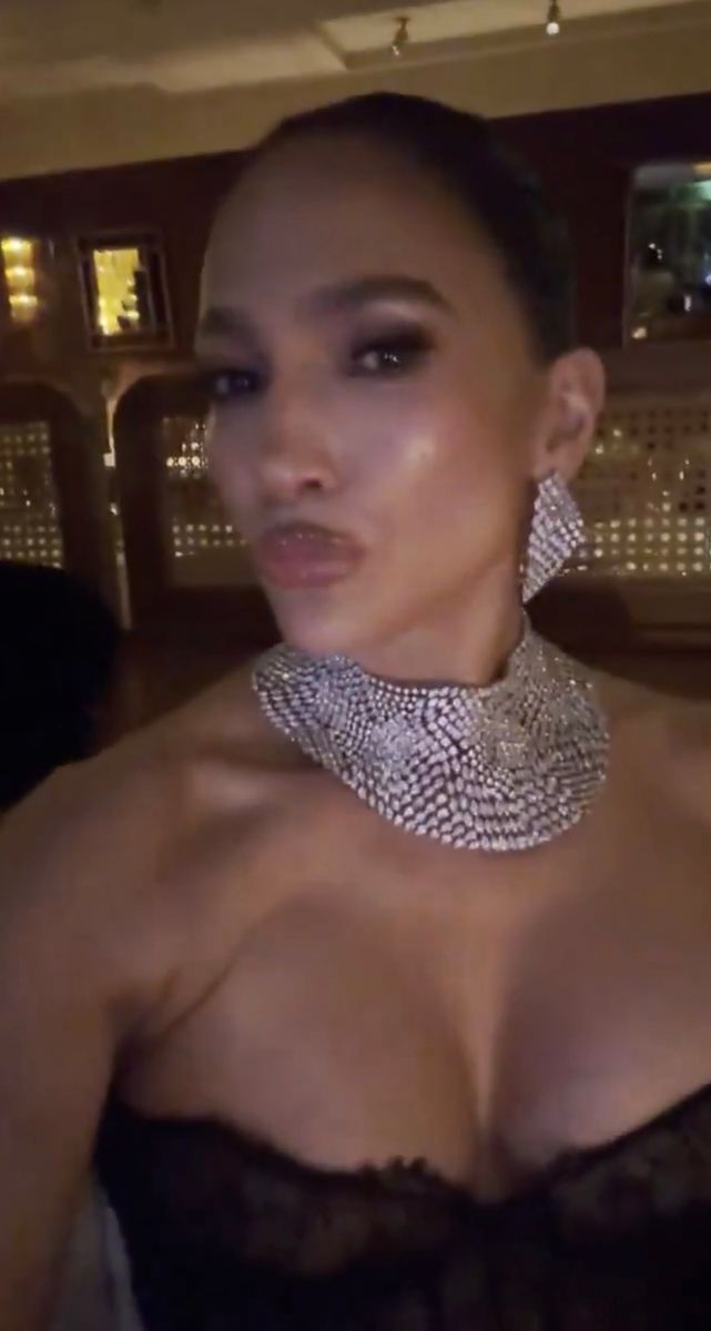 The singer completed her birthday look with dazzling diamond jewelry, a sleek bun and glowing signature makeup.