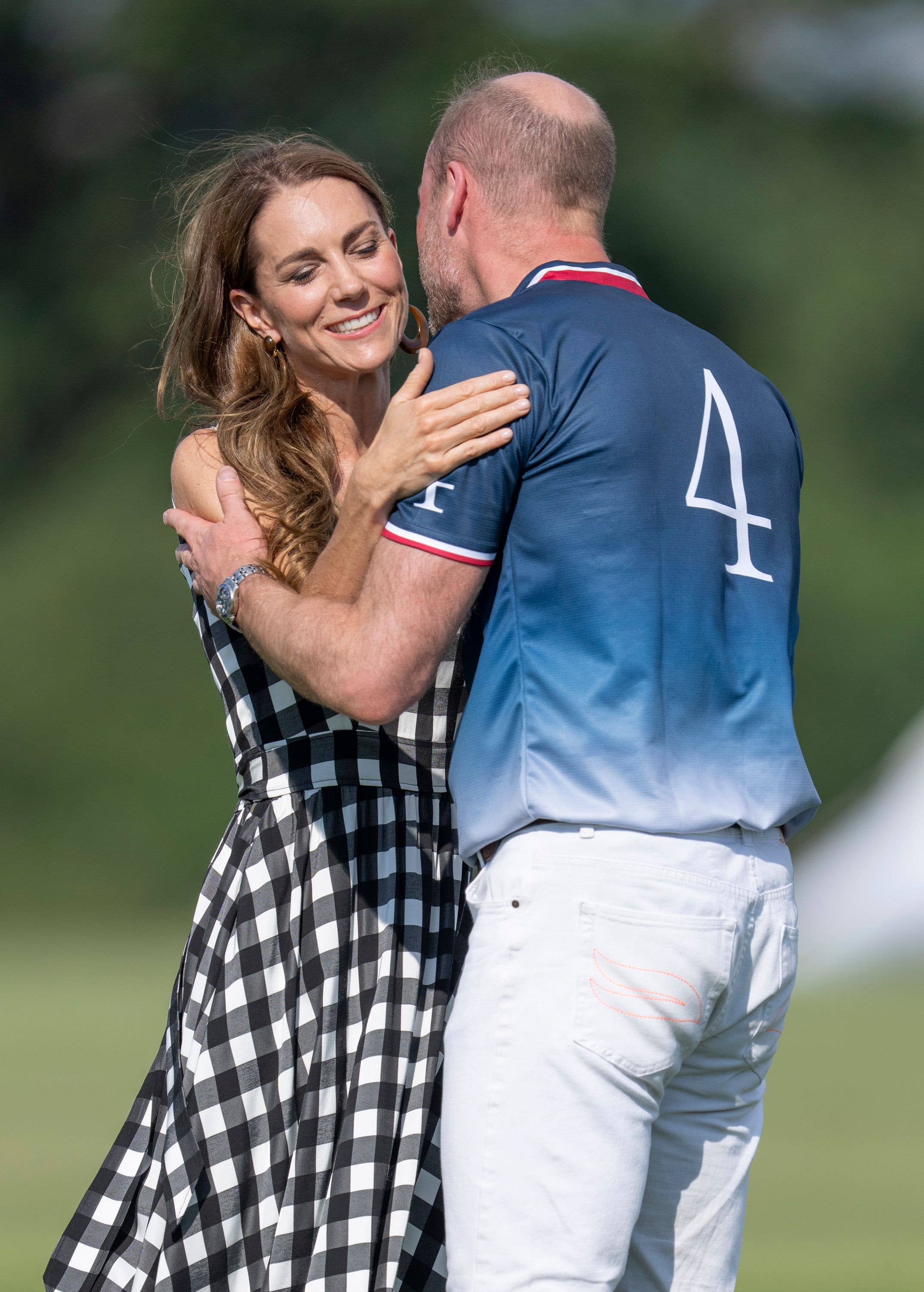 Kate Middleton sharing a kiss with Prince William