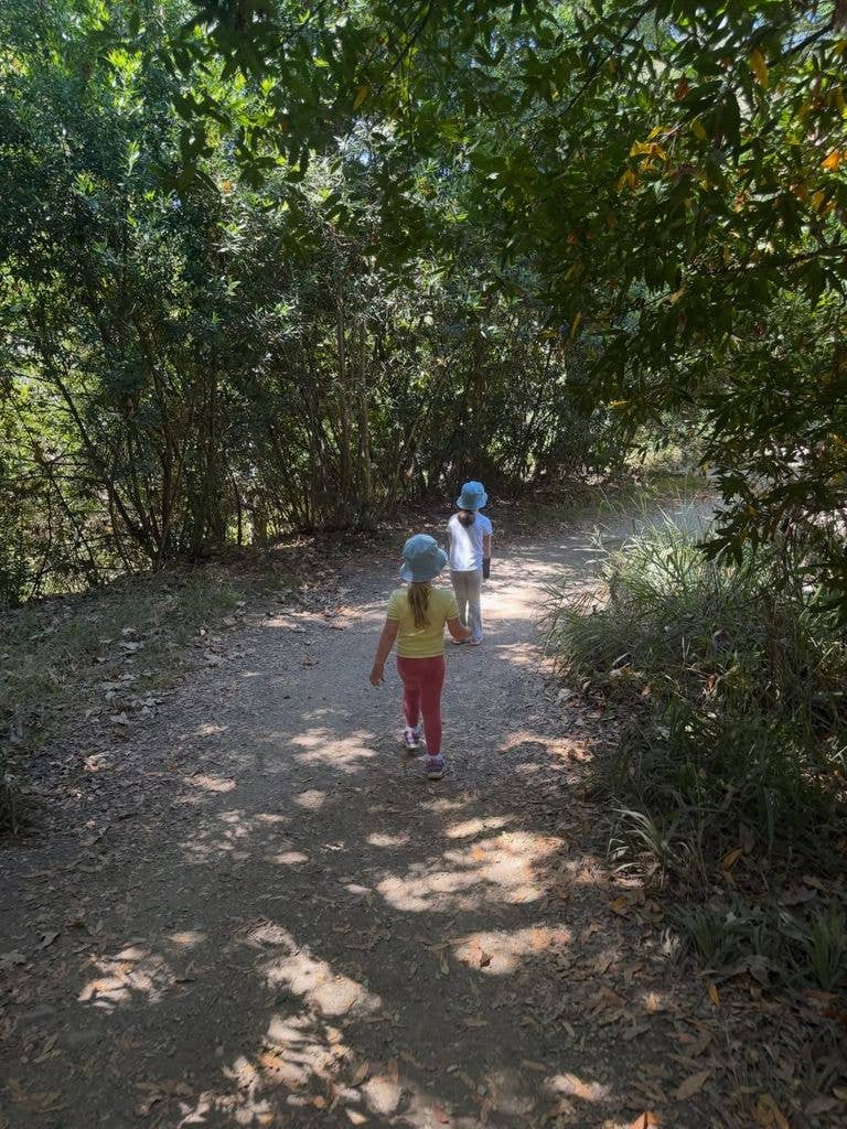 Katherine and Chris' kids running through the woods