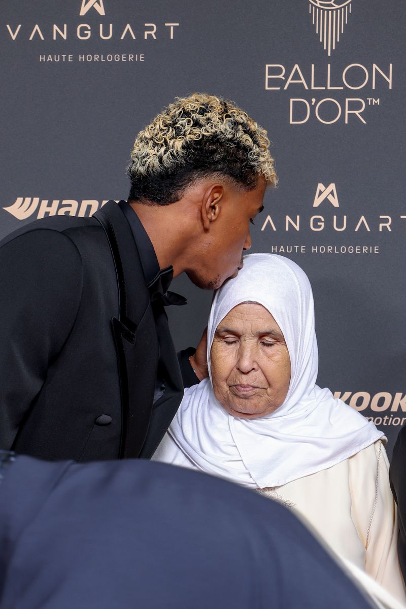 Lamine Yamal and his grandmother attend the 69th Ballon D'Or Photocall