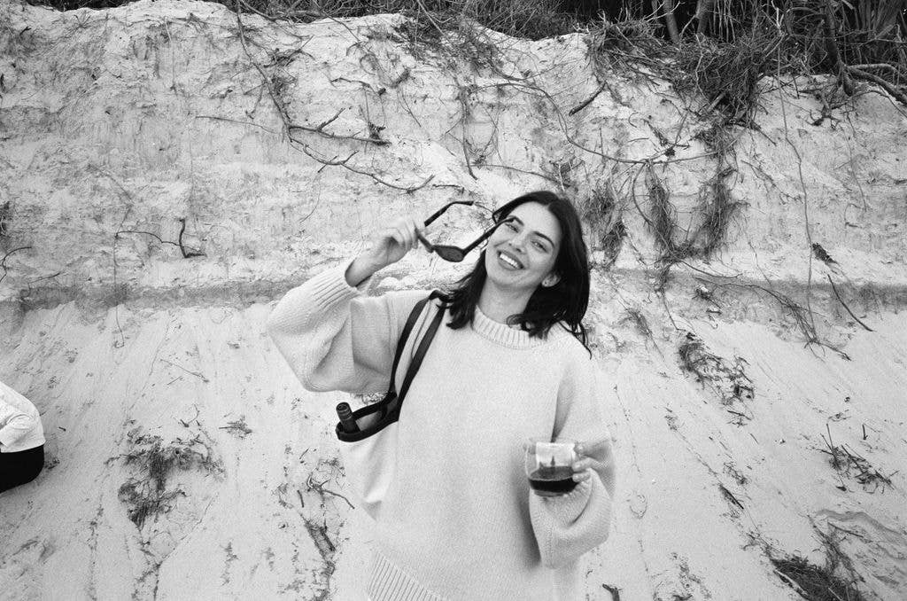 Black and white image of Kendall smiling