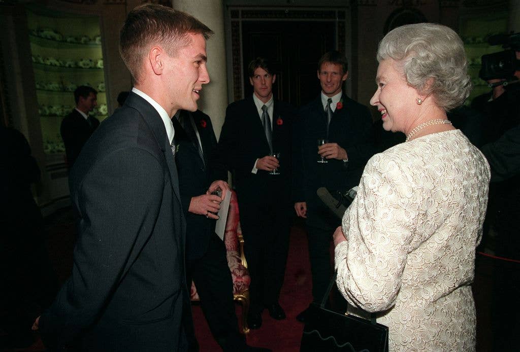 Michael Owen seen chatting with the late Queen during a reception at Buckingham Palace in 1998