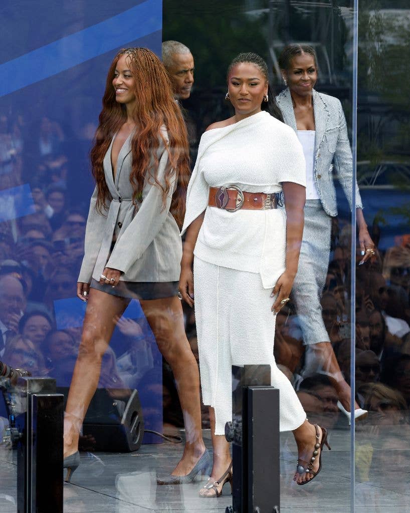 Malia Obama, former U.S. President Barack Obama, Sasha Obama, and former first lady Michelle Obama attend the dedication ceremony for the opening of the Barack Obama Presidential Center, in John Lewis Plaza, on June 18, 2026 in Chicago, Illinois. Barack Obama served as the 44th president of the United States from 2009 to 2017 and was the first African-American to hold the office. 