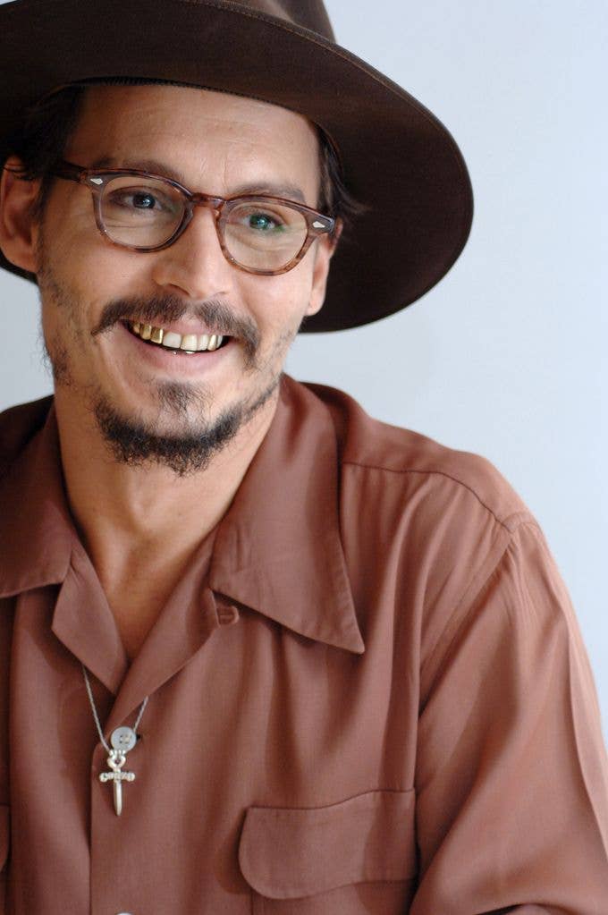 Johnny's perfect smile before his teeth eroded