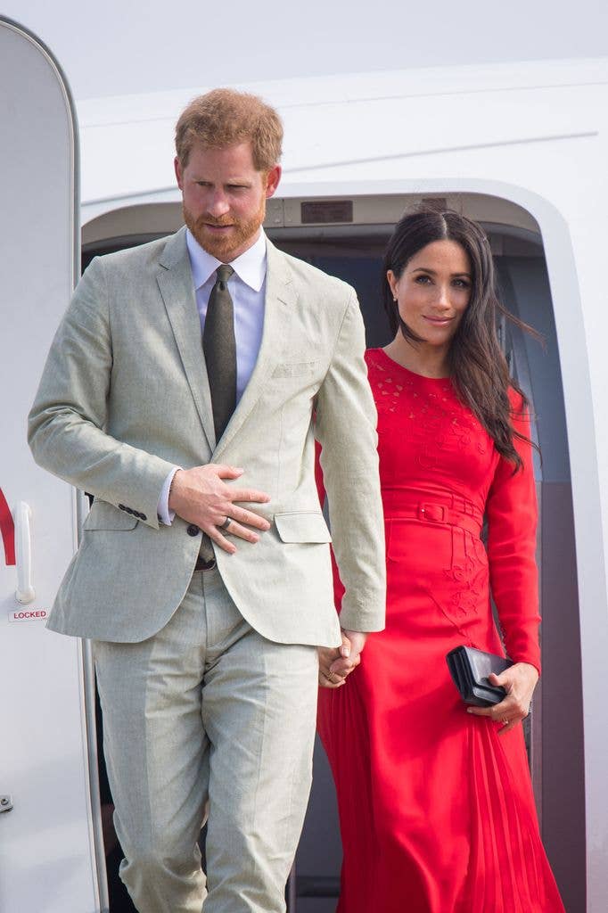 Prince Harry, Duke of Sussex and Meghan, Duchess of Sussex at an airport