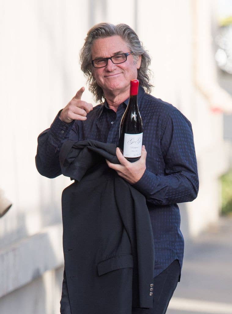 Kurt holding a bottle of his GoGi Wine 