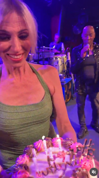 The singer got surprised by a birthday cake while performing
