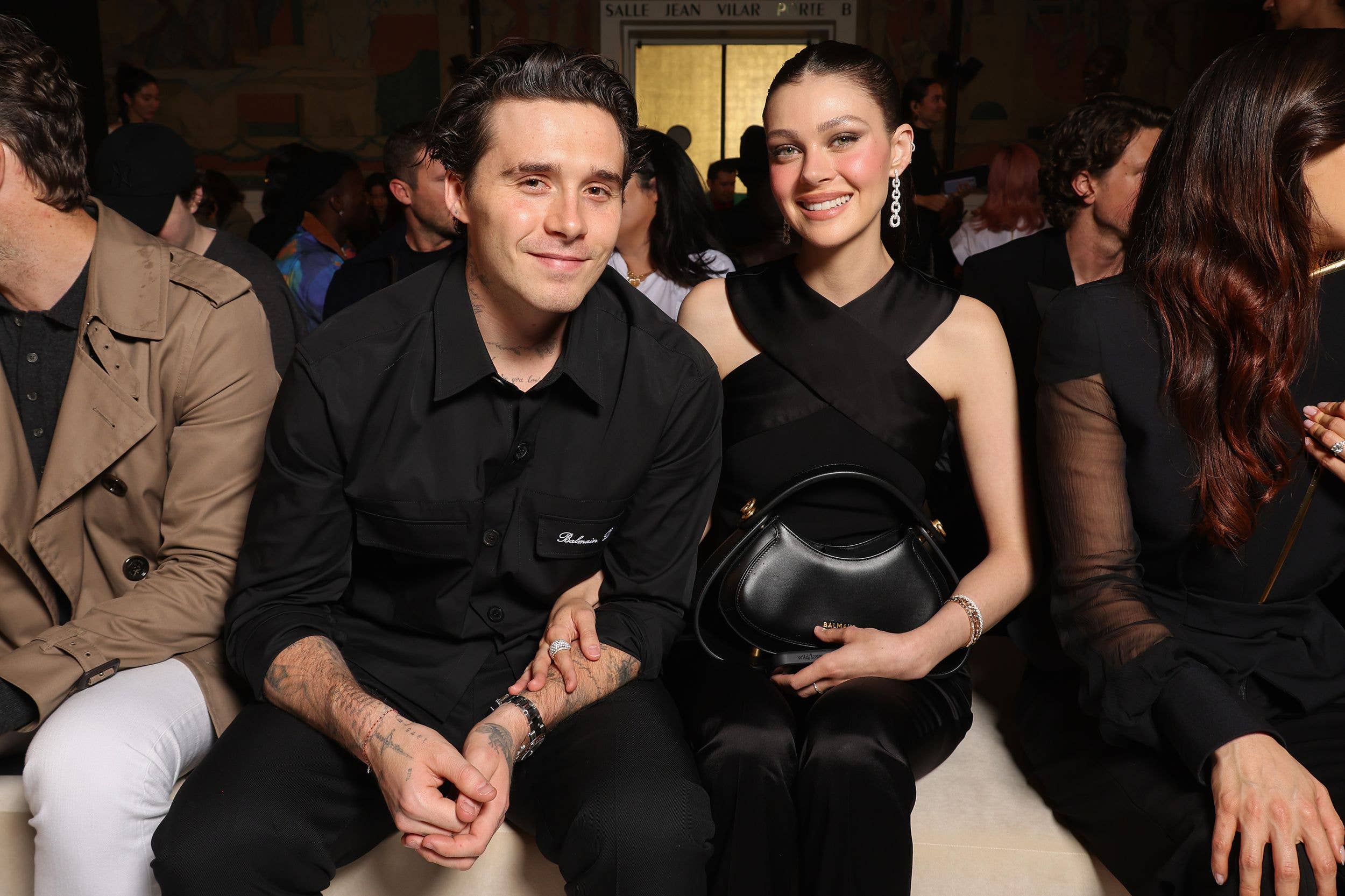 Brooklyn Beckham and Nicola Peltz attend the Balmain Womenswear Spring-Summer 2025 show as part of Paris Fashion Week