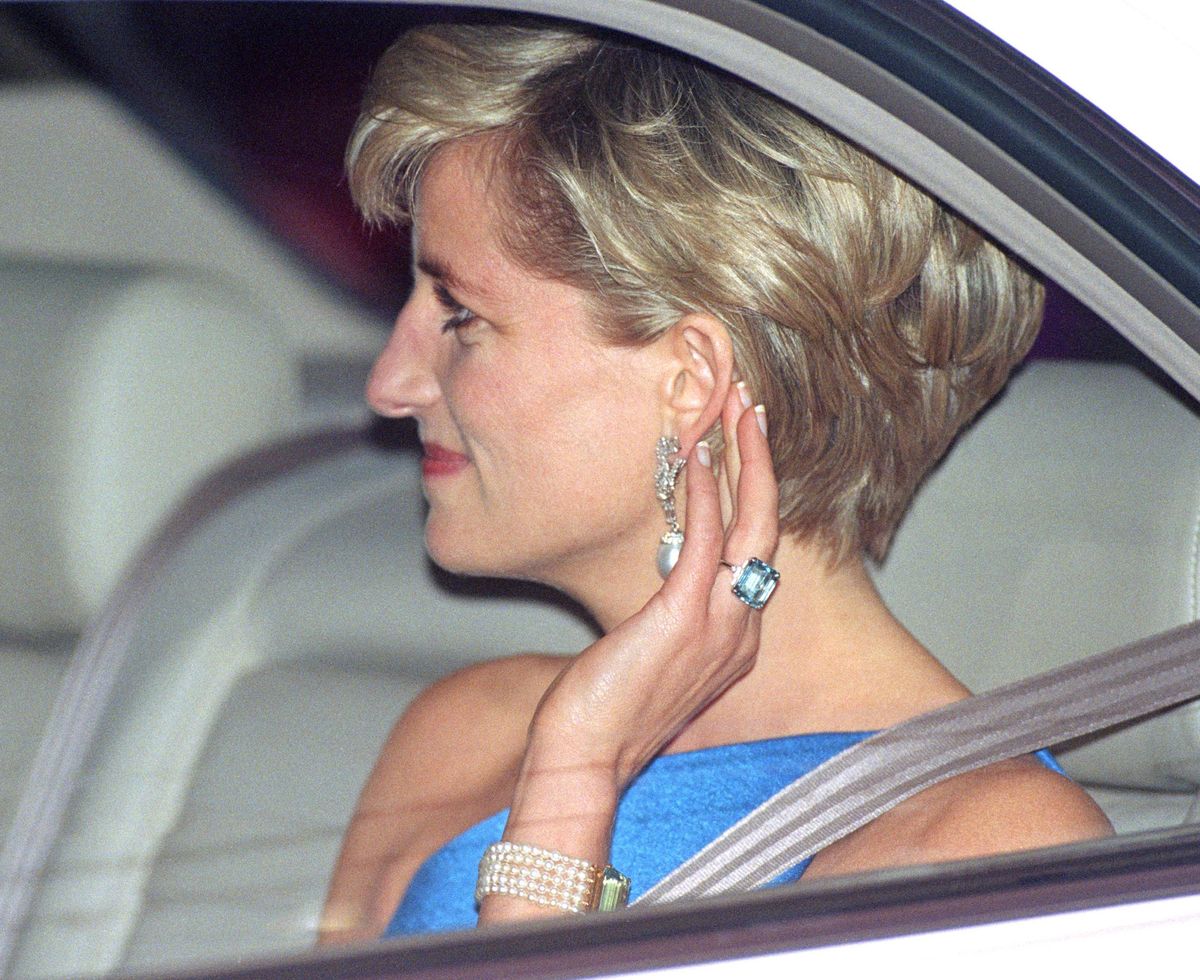 Princess Diana wore the striking aquamarine ring in the 1990s, years before the sentimental piece was later worn by Meghan.