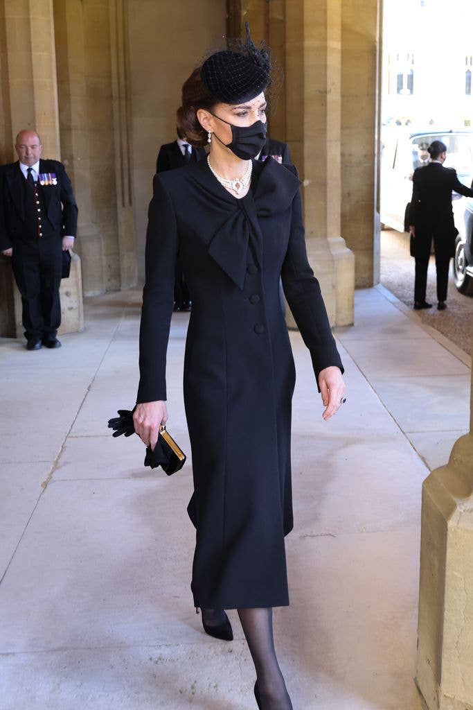 Although it was a somber day, Catherine’s elegance was on full display at Prince Philip’s funeral in a black Catherine Walker coat dress and netted veil.