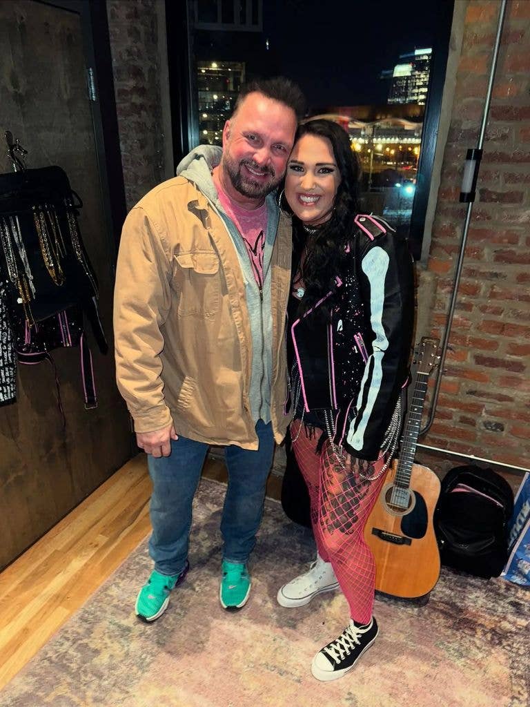 Garth Brooks hugging his daughter Allie Colleen