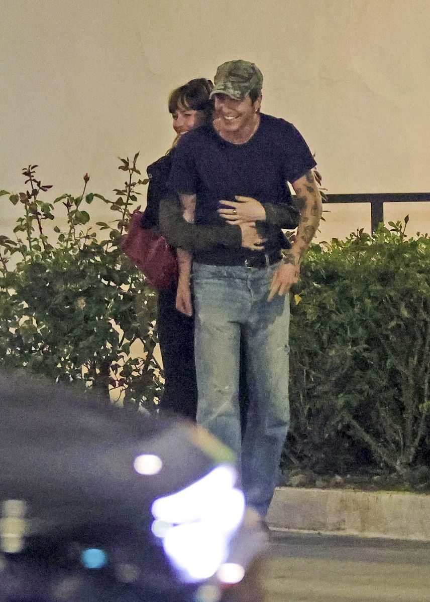 Dakota Johnson and Role Model during a night out in Los Angeles in April