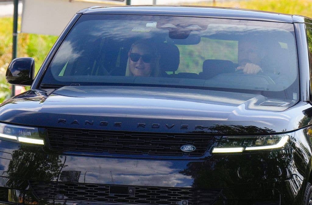 Crown Princess Mette-Marit and Crown Prince Haakon arrive at the National University Hospital to visit King Harald