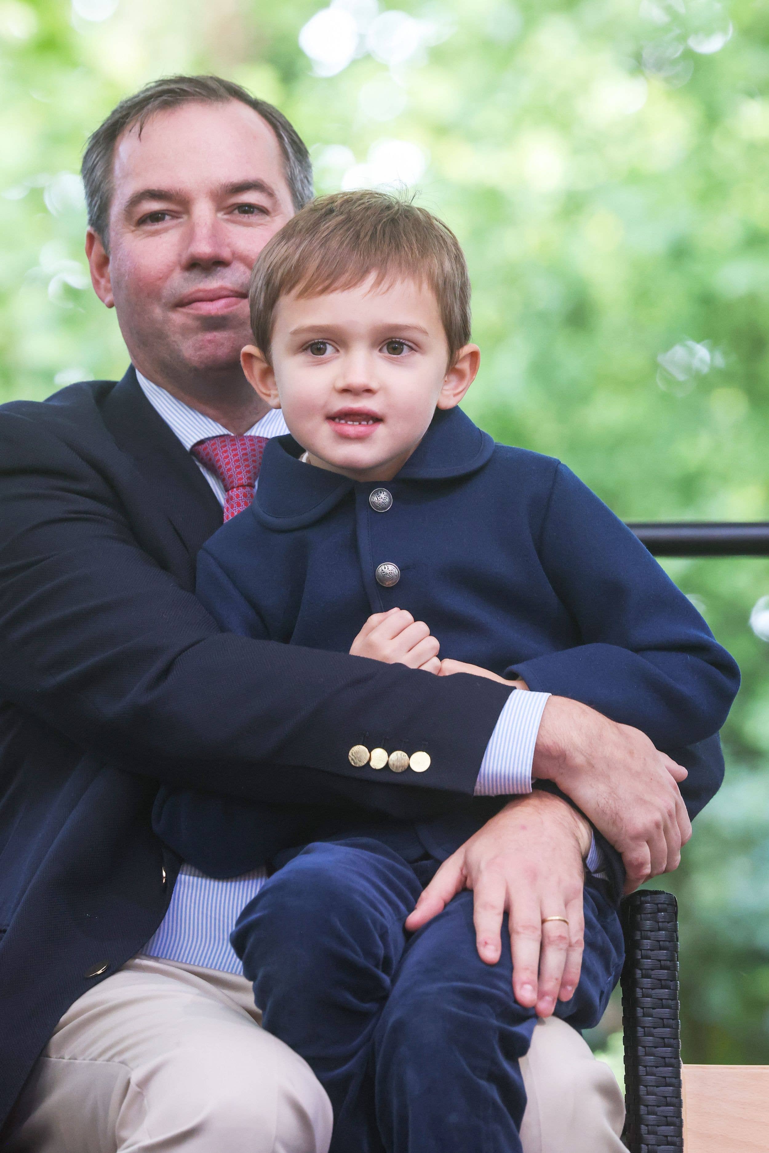Grand Duke Guillaume of Luxembourg and with his eldest, Prince Charles 