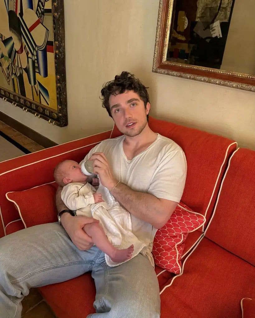 François Pinault Jr. feeding his newborn son, Francois
