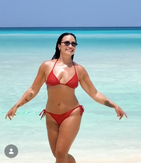 The star also donned a red and black bikini