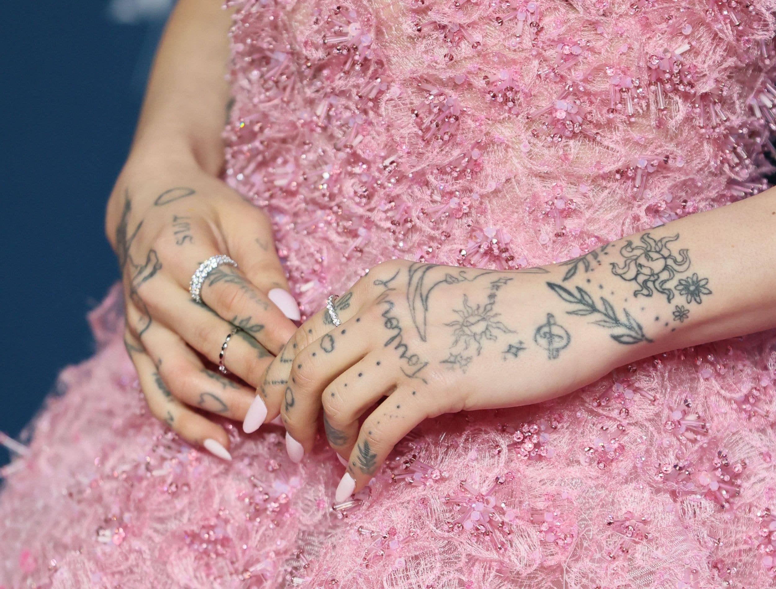 Ariana Grande, tattoo details,