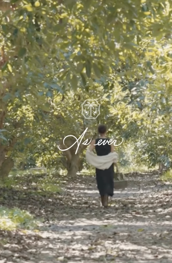 Meghan is seen walking off into a stunning orchard