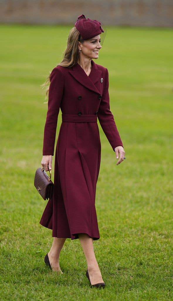 To greet President Donald Trump and First Lady Melania Trump in 2025, Catherine wore a burgundy Emilia Wickstead coatdress with a matching Jane Taylor hat. 