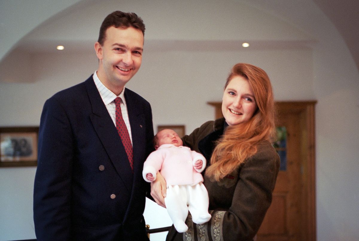 Eleonore von Habsburg pictured as a newborn with her parents, Karl von Habsburg and Francesca Thyssen-Bornemisza, during her official presentation in Salzburg in March 1994. More than three decades later, Eleonore is now a mom of three.