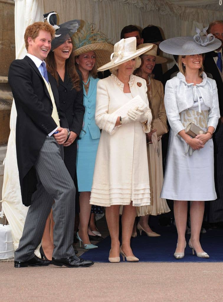 Prince Harry, Kate Middleton, Camilla, and Sophie laugh in smart dress and hats
