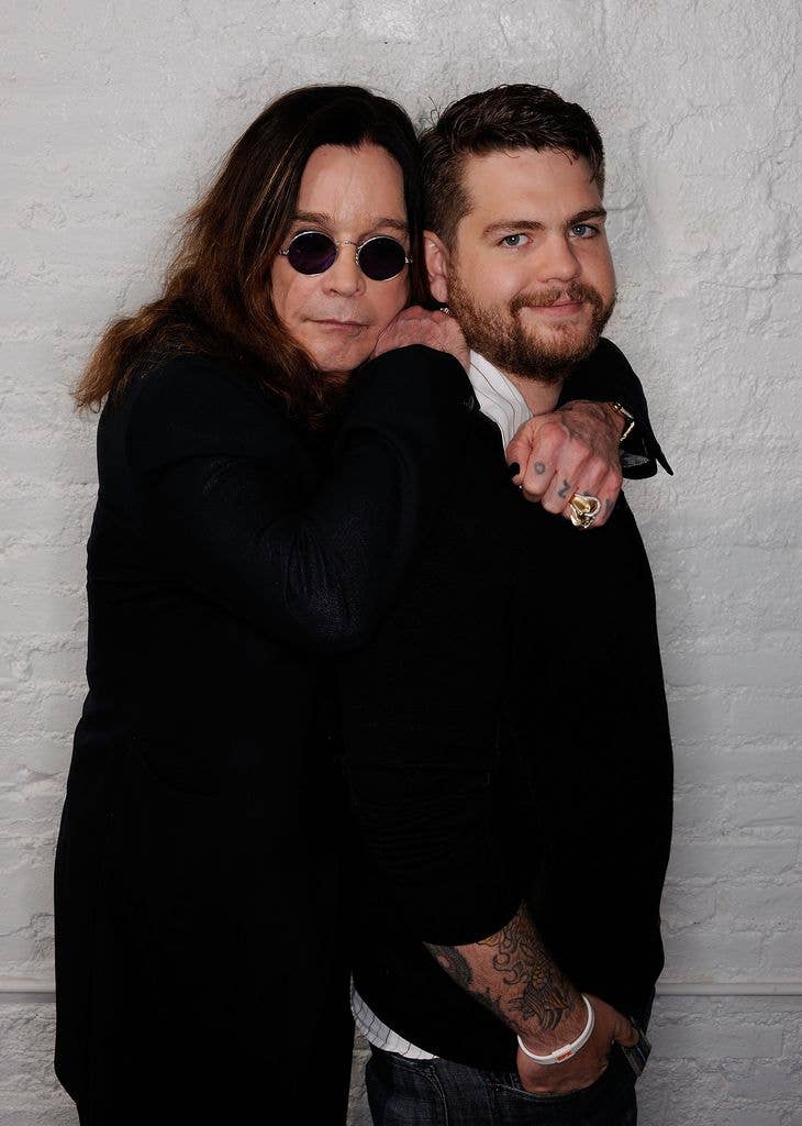 photo of ozzy osbourne hugging jack osbourne