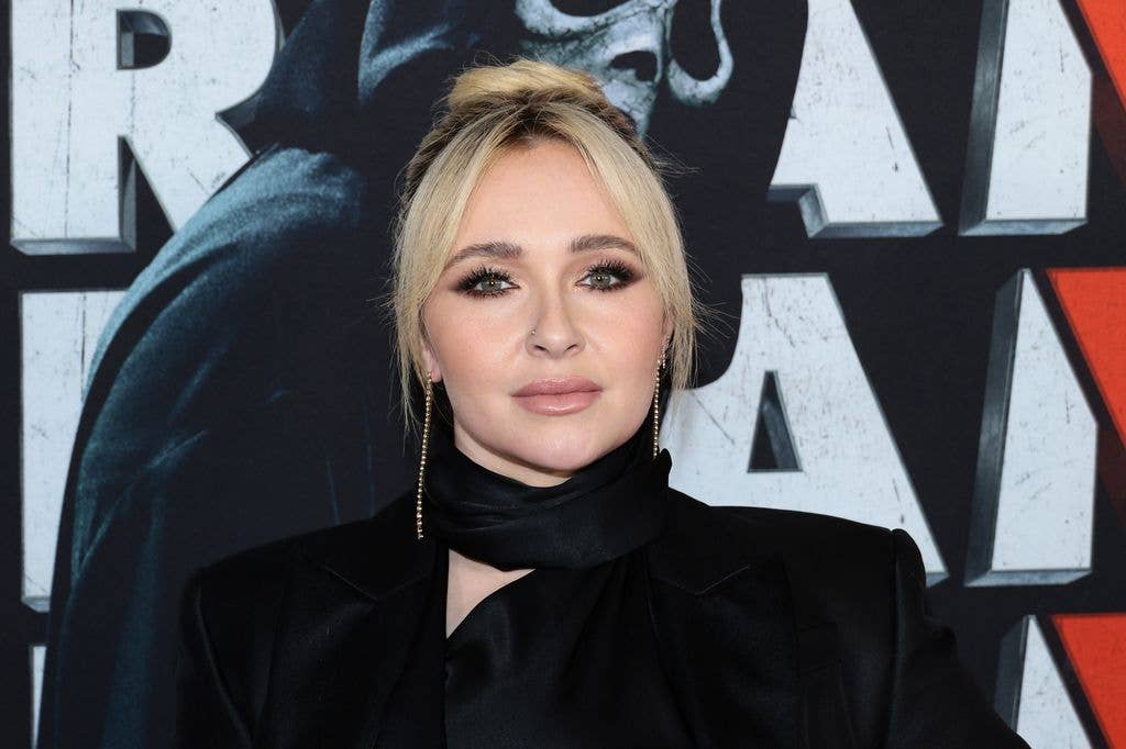 Hayden Panettiere wearing black looking serious