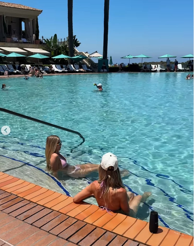 Christina and her teen daughter Taylor relaxing in the swimming pool 