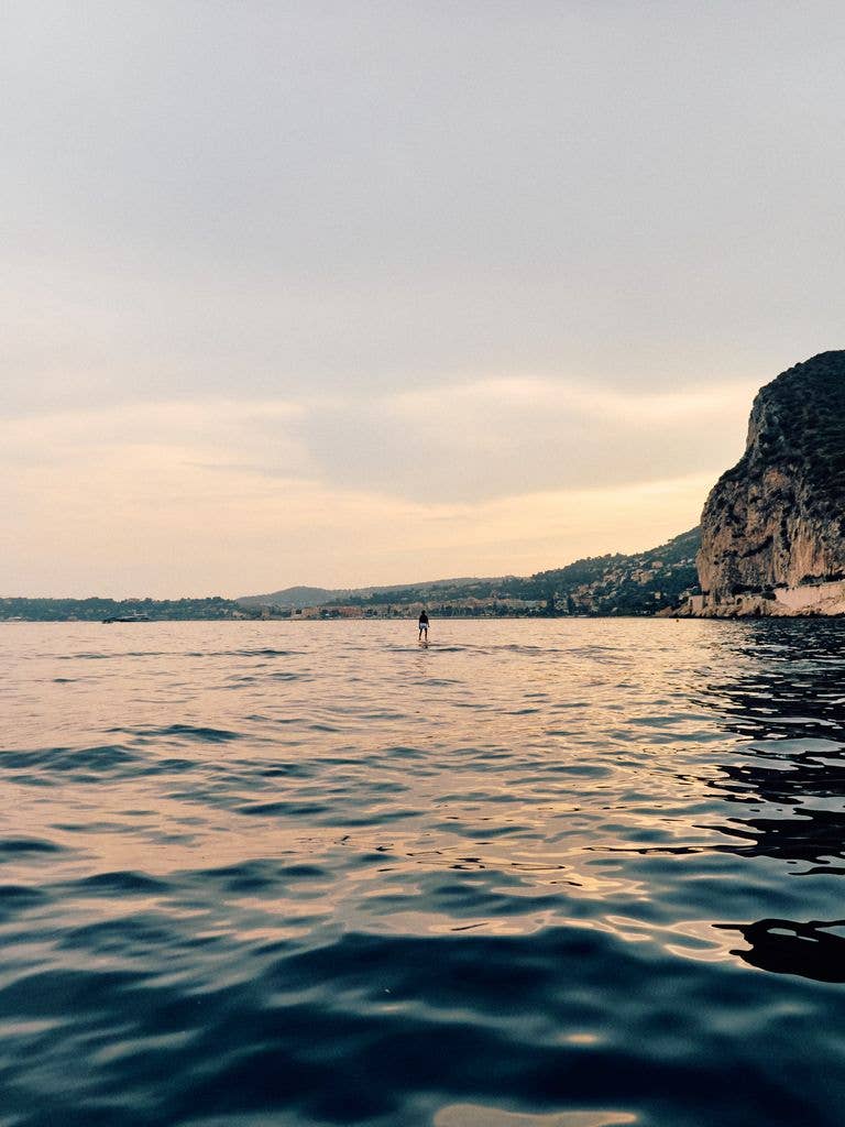 Tom Brady pictured surfing while celebrating his 49th birthday on a yacht, shared on Instagram