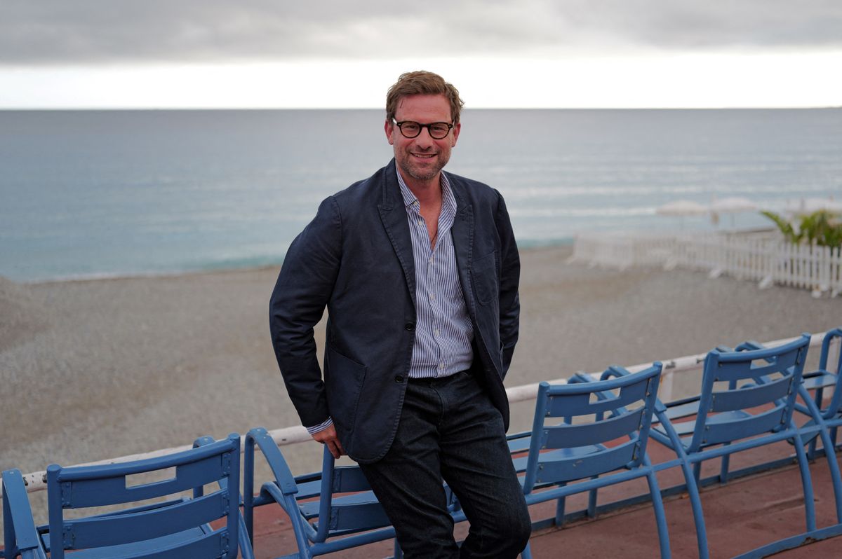 French writer Nicolas Mathieu poses during a photocall for the movie "Leurs enfants apres eux" as part of the Cineroman film festival