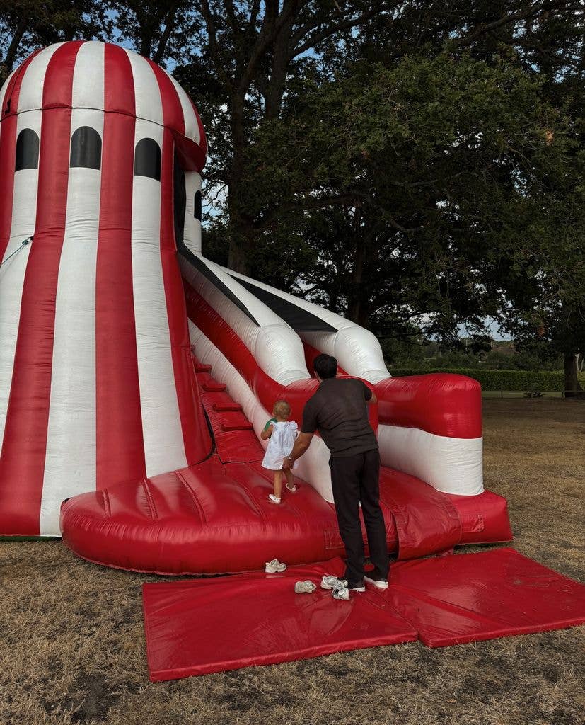Michelle Keegan and Mark Wright's daughter Palma looked to be enjoying the inflatables