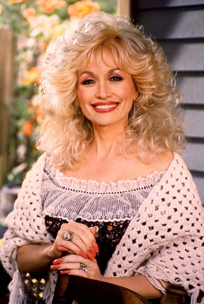 Dolly Parton smiling in portrait from 1995