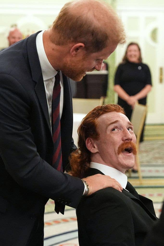 Prince Harry, the Duke of Sussex, joked about red hair with William Bringer as he arrived to speak at a roundtable about support for veterans