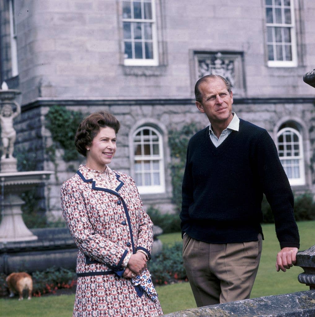 Queen Elizabeth II and Prince Philip standing outside Balmoral
