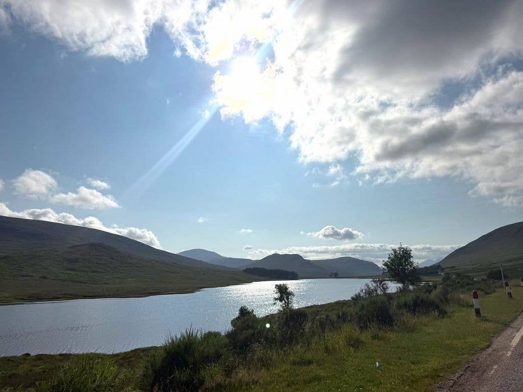 According to the Mail on Sunday, this photograph was taken next to Loch Droma on the A835 Inverness to Ullapool road, which is 25 miles from Tanera Mor
