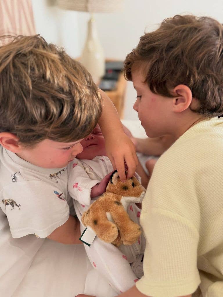 August and Ernest were so excited to meet their younger sister!