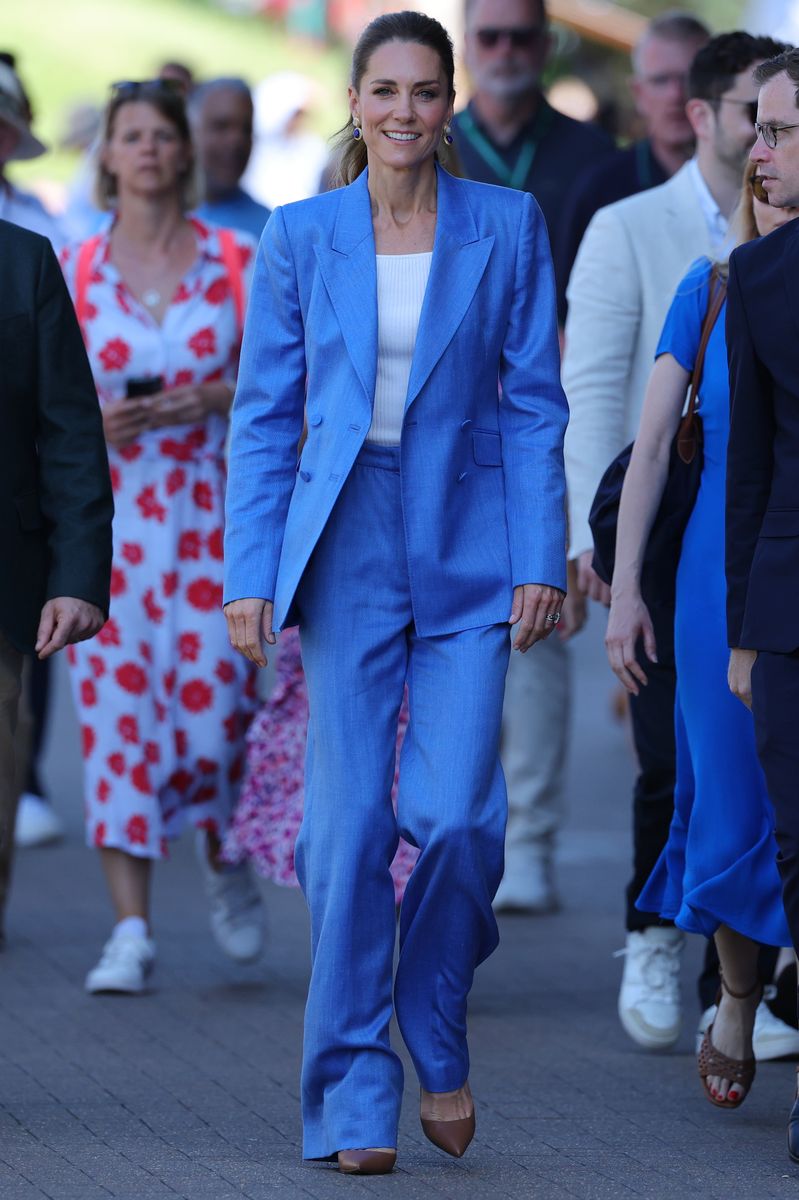 The royal refreshed traditional workwear in a pale blue Gabriela Hearst suit, white H&M T-shirt and caramel pumps at Wimbledon on July 2, 2026.
