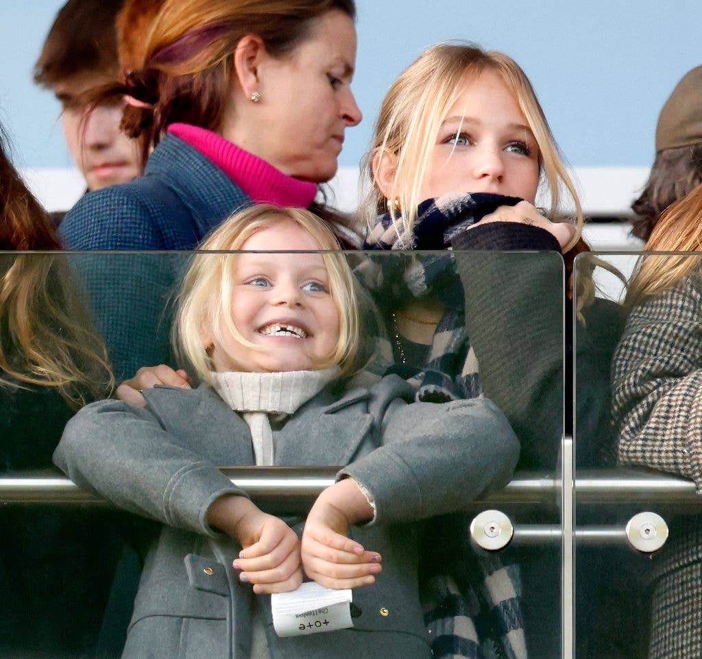 Lena Tindall and Isla Phillips watch the racing as they attend the New Year's Day Racing Meet at Cheltenham Racecourse on January 1, 2026 