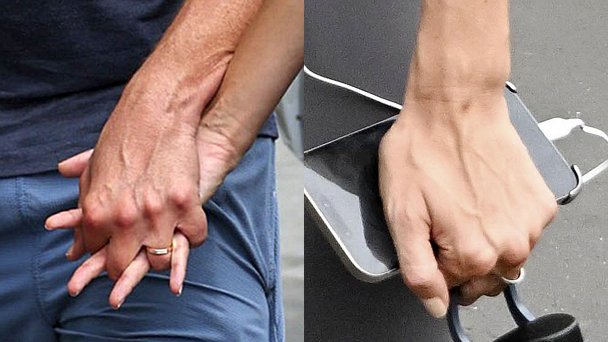 A close up of Hadid and Cooper's rings