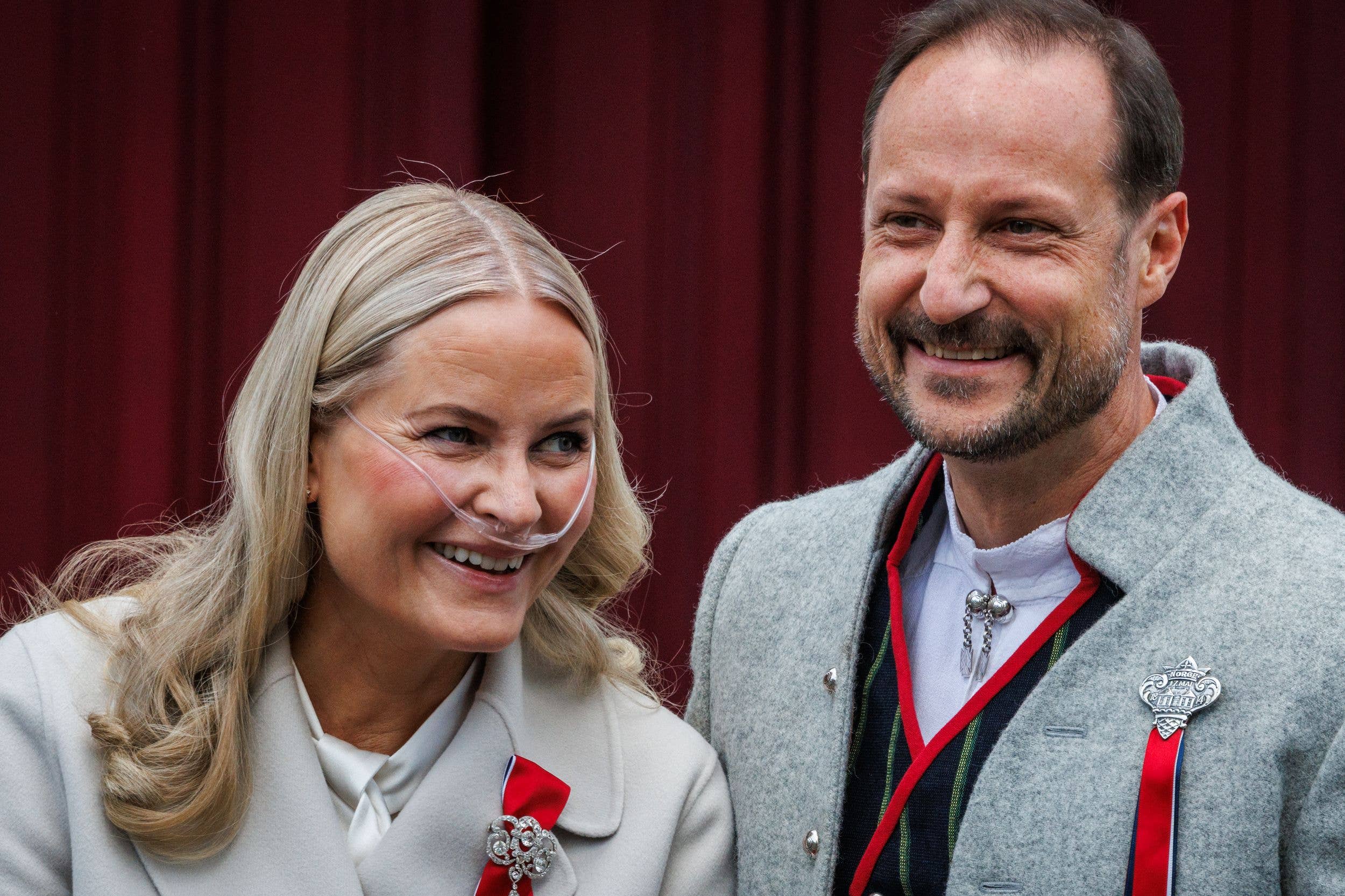 rown Princess Mette Marit of Norway (L) and Crown Prince Haakon of Norway attend the Norwegian Constitution Day with the children's parade at their residence Skaugum on May 17, 2026 