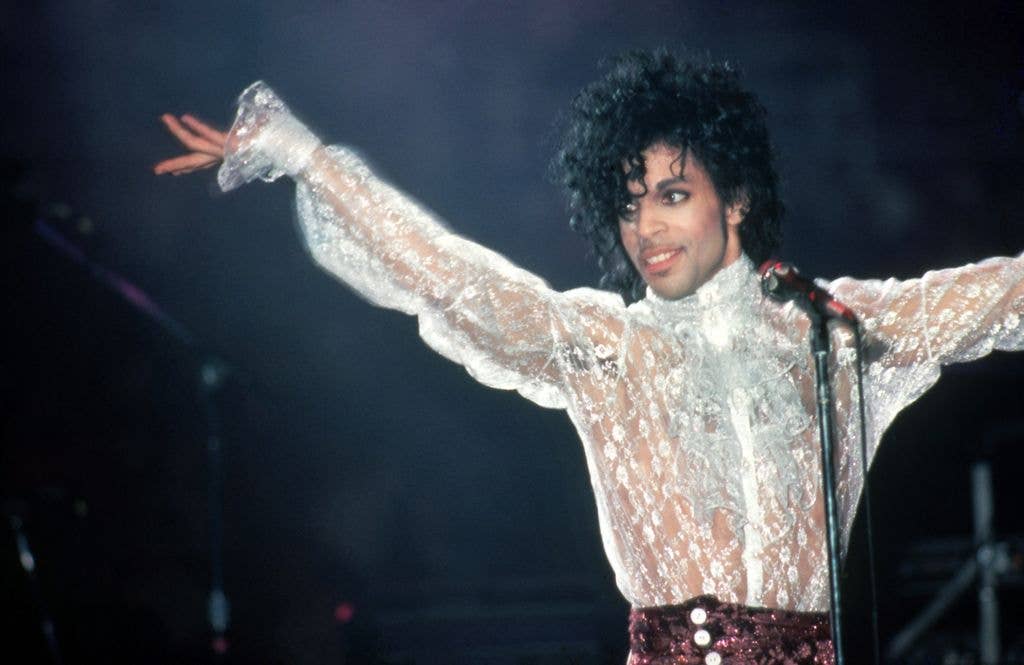 American singer, songwriter, musician, record producer, dancer, actor, and filmmaker Prince (1958-2016) performs onstage during the 1984 Purple Rain Tour on November 4, 1984, at the Joe Louis Arena in Detroit, Michigan.