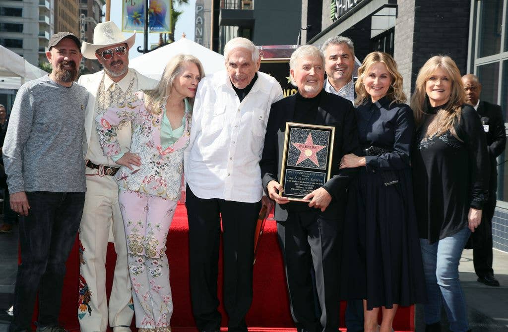  Greg Garcia, David Arquette, Beverly D'Angelo, Marty Krofft, Sid Krofft, Christopher Knight, Maureen McCormick and Susan Olsen attend Sid and Marty Krofft honored with a Star on the Hollywood Walk of Fame on February 13, 2020 in Hollywood, California. 